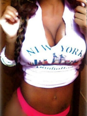 Busting out of her outfits while flaunting her cleavage